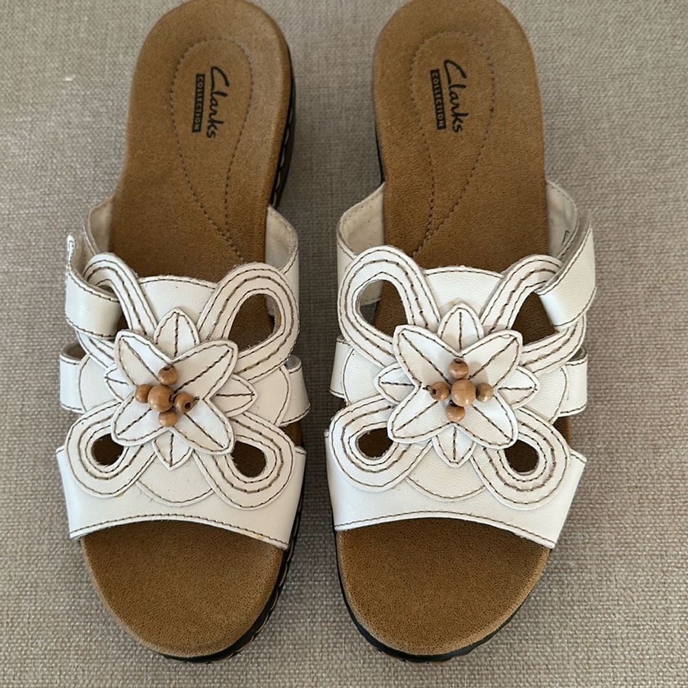 Clarks white leather upper slide sandals. New without a box.